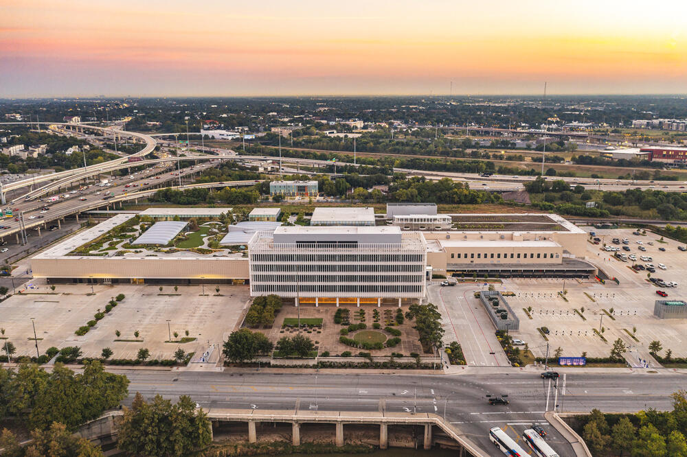 Renovated Houston Post Office features green roof, rooftop farm, and amenity event space